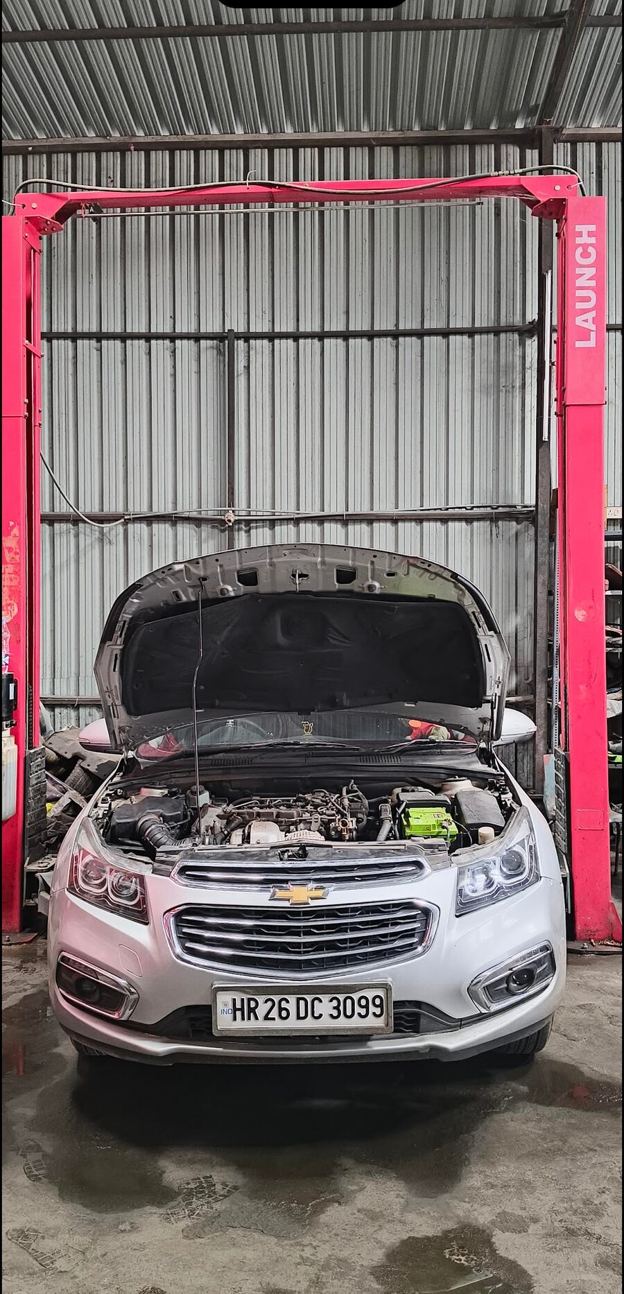 Engine bay open during diagnosis at MPS specialist car workshop Hyderabad
