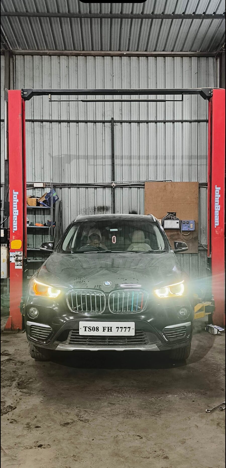 Front-end repair on a car at Metre Per Second service centre, KPHB Hyderabad