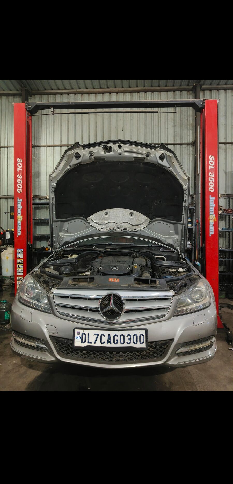 Car undergoing mechanical service at MPS workshop in Hyderabad