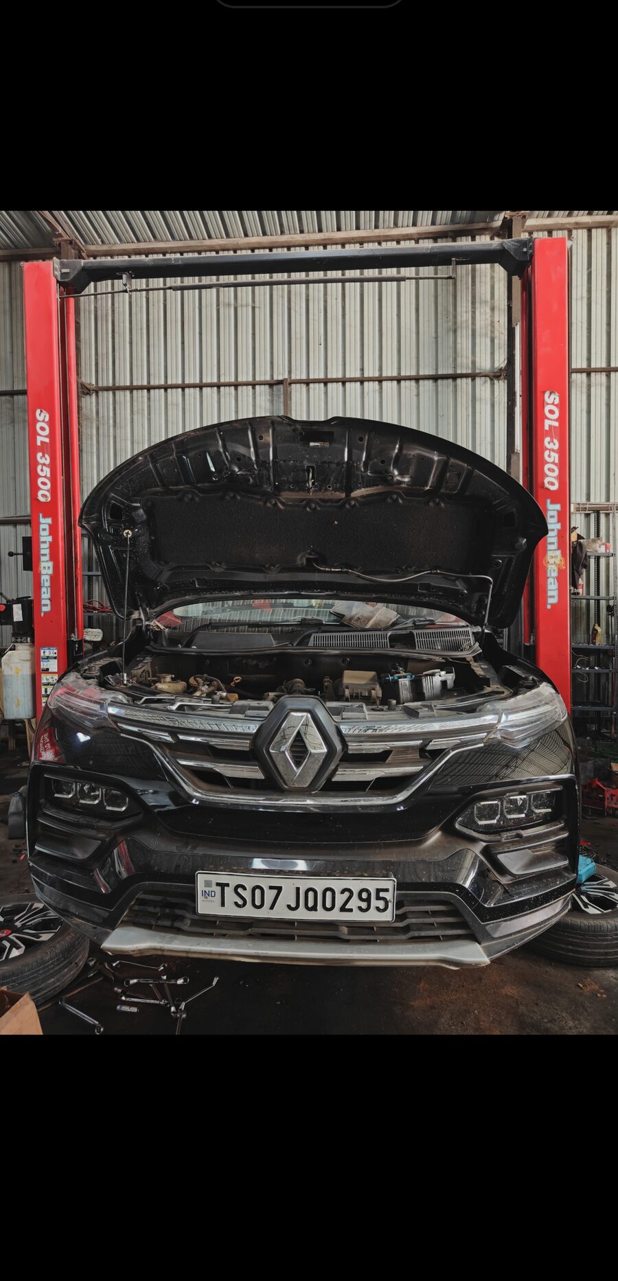 Suspension and underbody work on a raised vehicle at MPS Hyderabad
