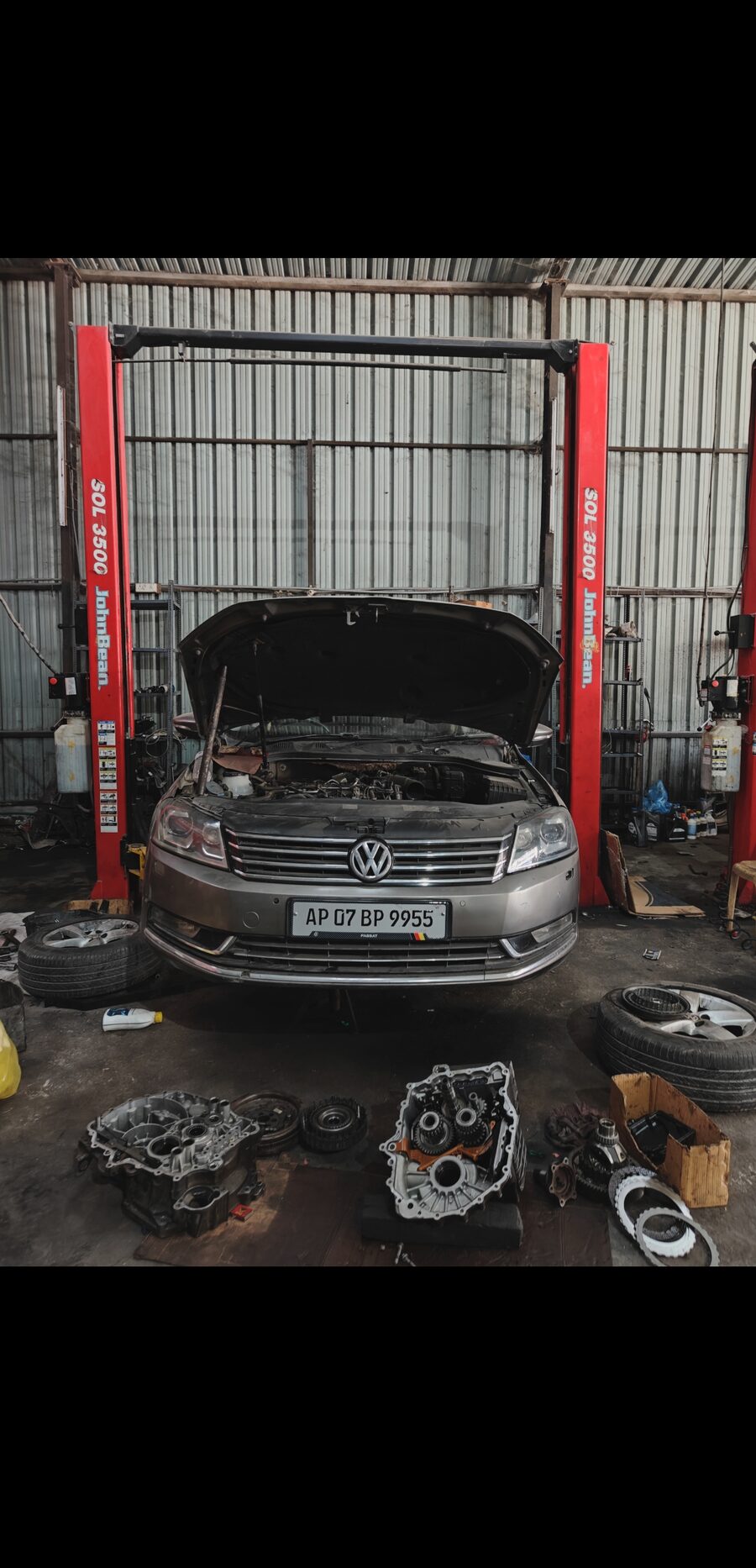 Car bonnet open for periodic maintenance at MPS workshop KPHB