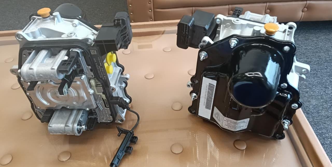 Two Volkswagen Group DSG mechatronic units displayed side by side